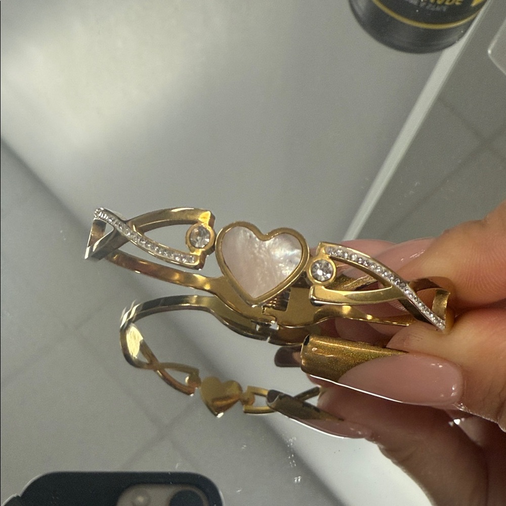 Elegant Gold and Silver Heart Bracelet